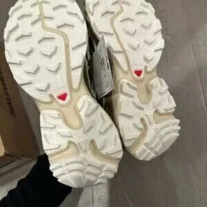 Salomon Black and Gold Sneakers